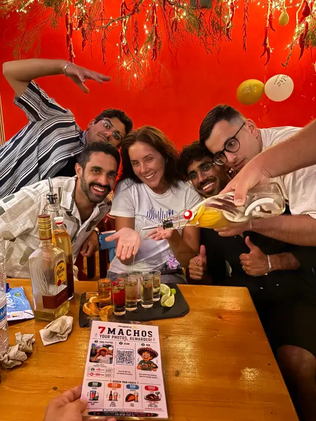 A group of friends celebrating at 7 Machos